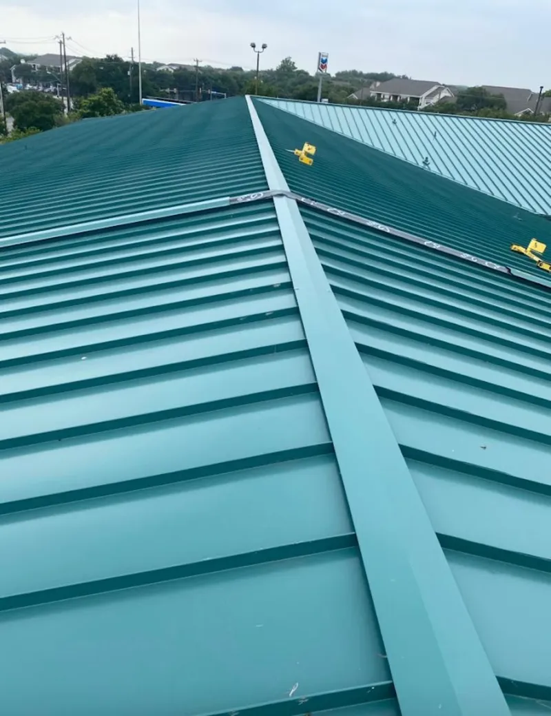 Green commercial metal roof ridge and valley for Metal Roof Repair in Lennox